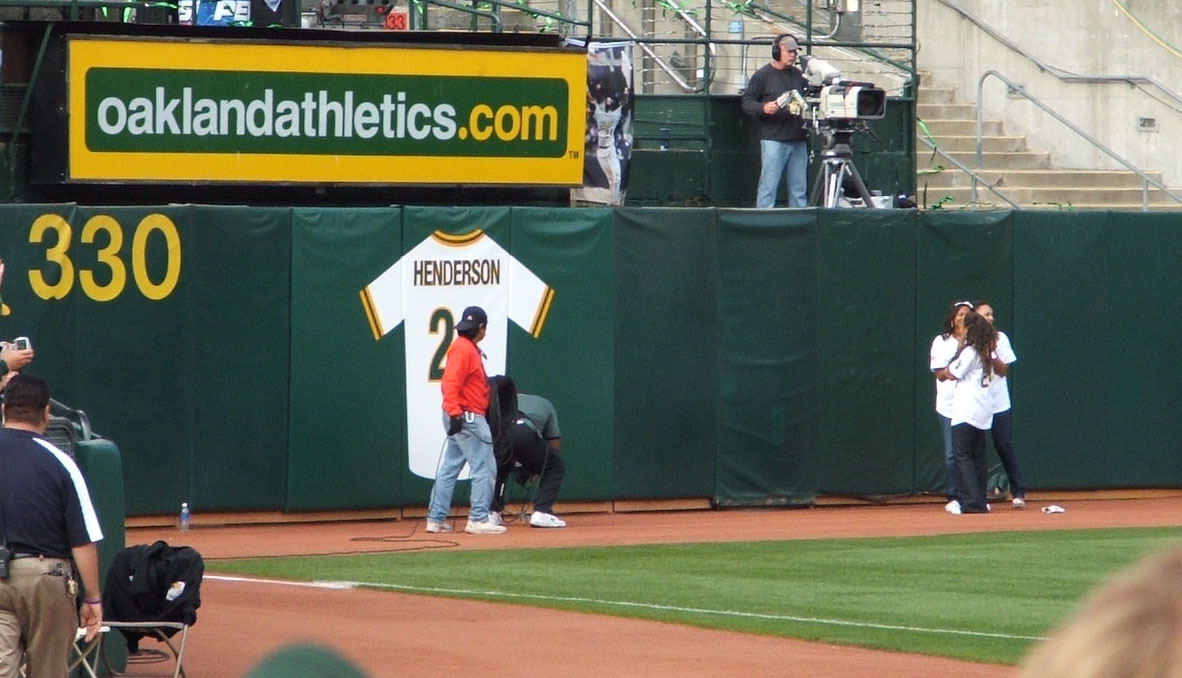 Rickey's daughters unveiling his jersey on left field fence.jpg